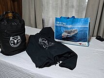 Rucksack Active und Regenjacke Wuiderer Merchartikel