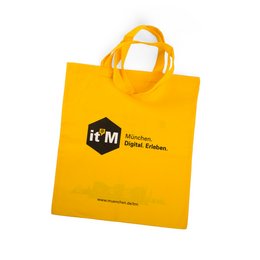 Gelbe und bedruckte Logo-Tasche aus Baumwolle mit Werbe-Druck.