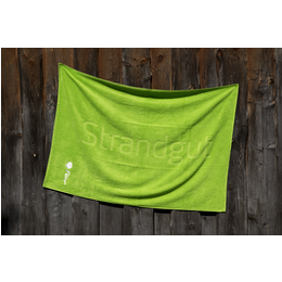 Hochwertiges Strandhandtuch aus Frottier mit individueller Hoch-Tief Einwebung für Föhr Tourismus