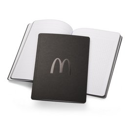Stilbewusstes und modernes Werbe-Notizbuch mit starker Werbewirkung: Werbe-Tablet-Book A5 oder A4 Complete native schwarz mit schwarz-glänzender Logo-Prägung für McDonald’s geprägt.
